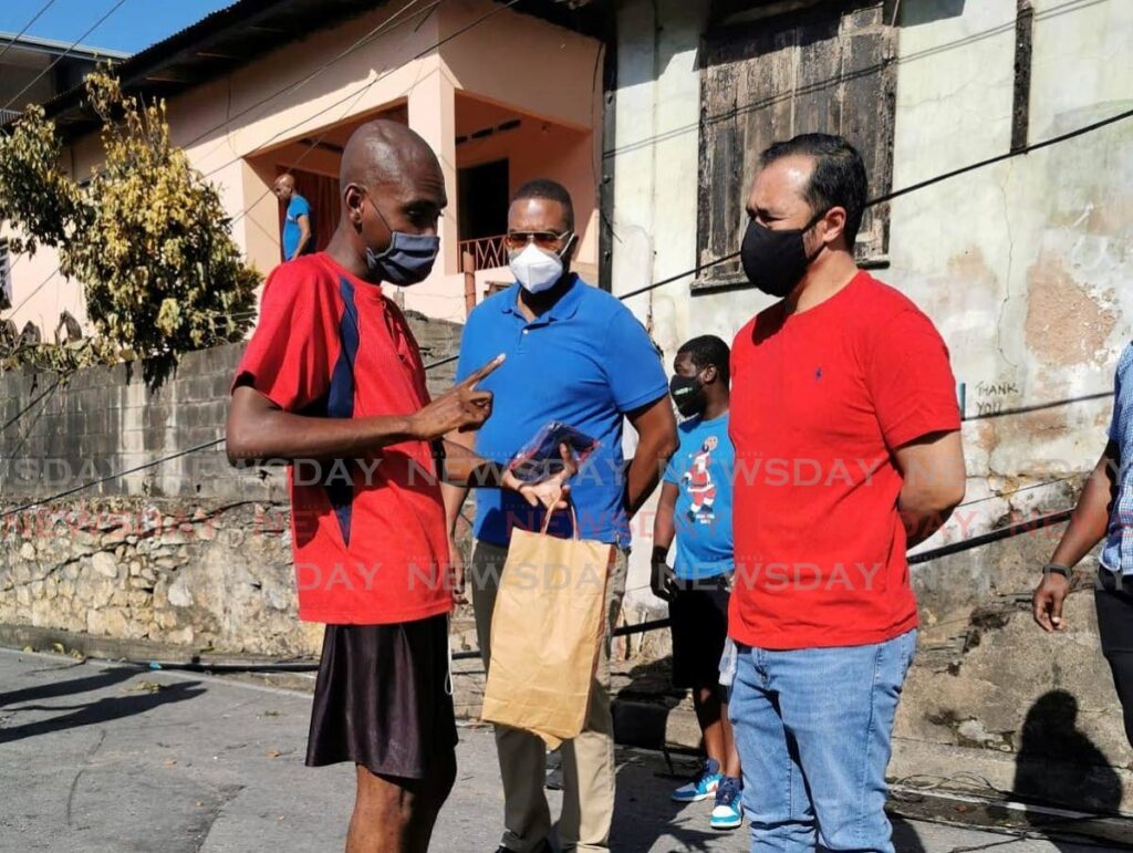 Port of Spain North/St Ann's West MP Stuart Young visited affected residents on January 1. - 