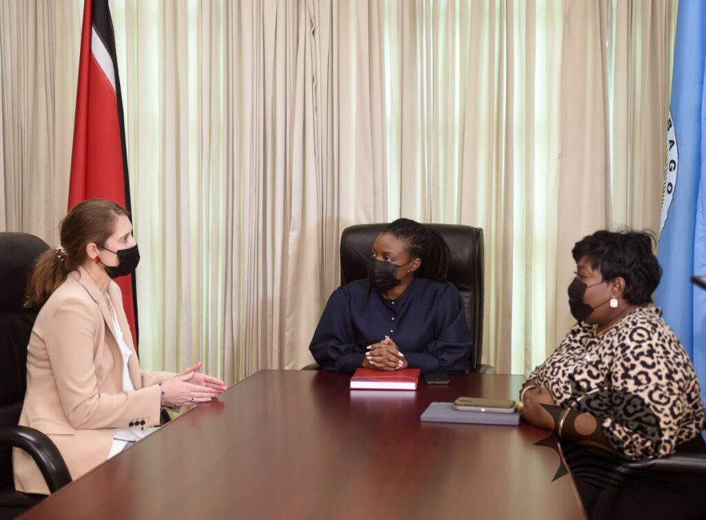 Tourism Secretary Tashia Burris, centre, chats with British High Commissioner Harriet Cross, left, and Assistant Secretary Megan Morrison on Tuesday.  - 
