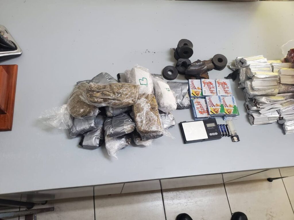 A quantity of cigarettes, marijuana and wrapping paper was found in a garbage bin at the Arouca Maximum Security Prison on Wednesday afternoon. 
PHOTO COURTESY TTPS -
