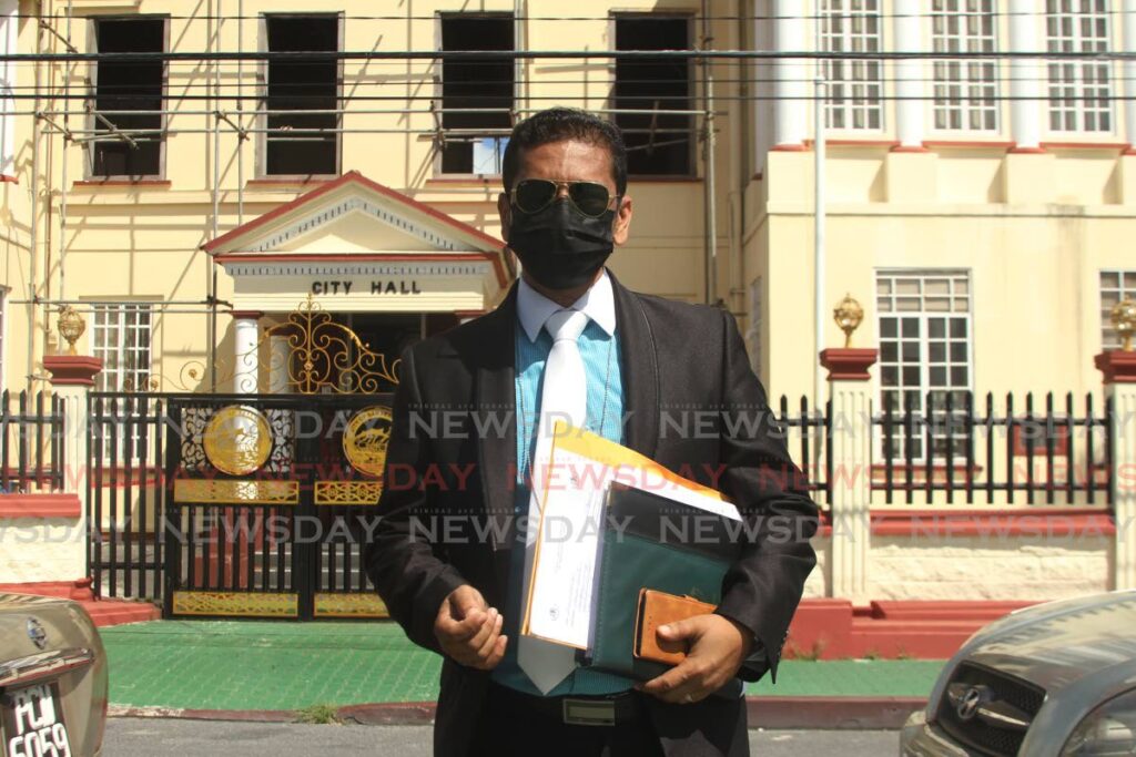 PSA's Industrial Relations Officer Ricardo Goolcharan outside City Hall San Fernando, which is currently under renovations. - Photo by Marvin Hamilton