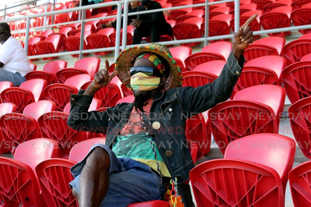 Avid cricket fan and Diego Martin resident Ato enjoys a day of cricket, on Wednesday, for the ICC U19 World Cup match between West Indies and Papa New Guinea, at the Diego Martin Sporting Complex.  - SUREASH CHOLAI