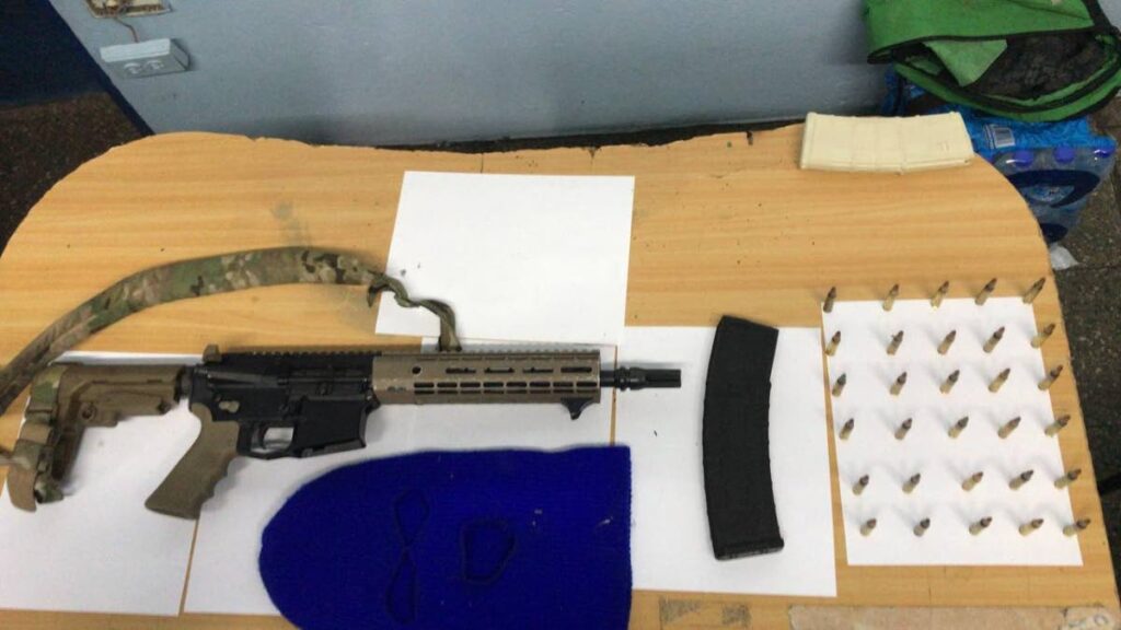The AR15 rifle and ammunition found in Santa Cruz. PHOTO COURTESY TTPS - 