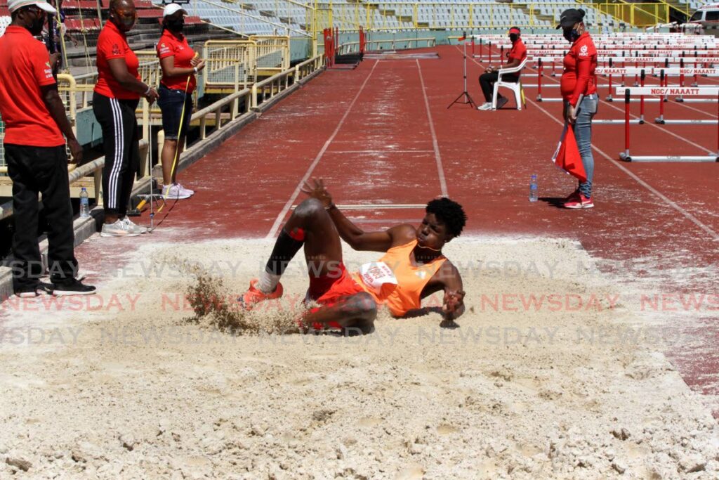 Neon Wolves' Aaron Antoine lands his jump in the Boys U20 long jump, at the NAAA preparation meet, on Saturday, at the Hasely Crawford Stadium, Port of Spain. - Angelo Marcelle