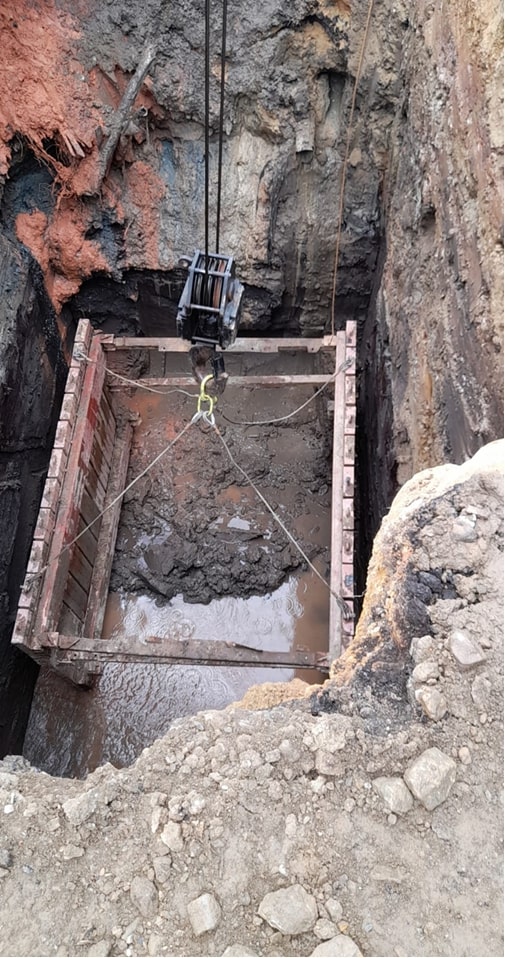 This undated photo sent to media by WASA on Sunday shows ongoing excavation work associated with installation of the third and final manhole at Beetham Gardens. PHOTO COURTESY WASA 