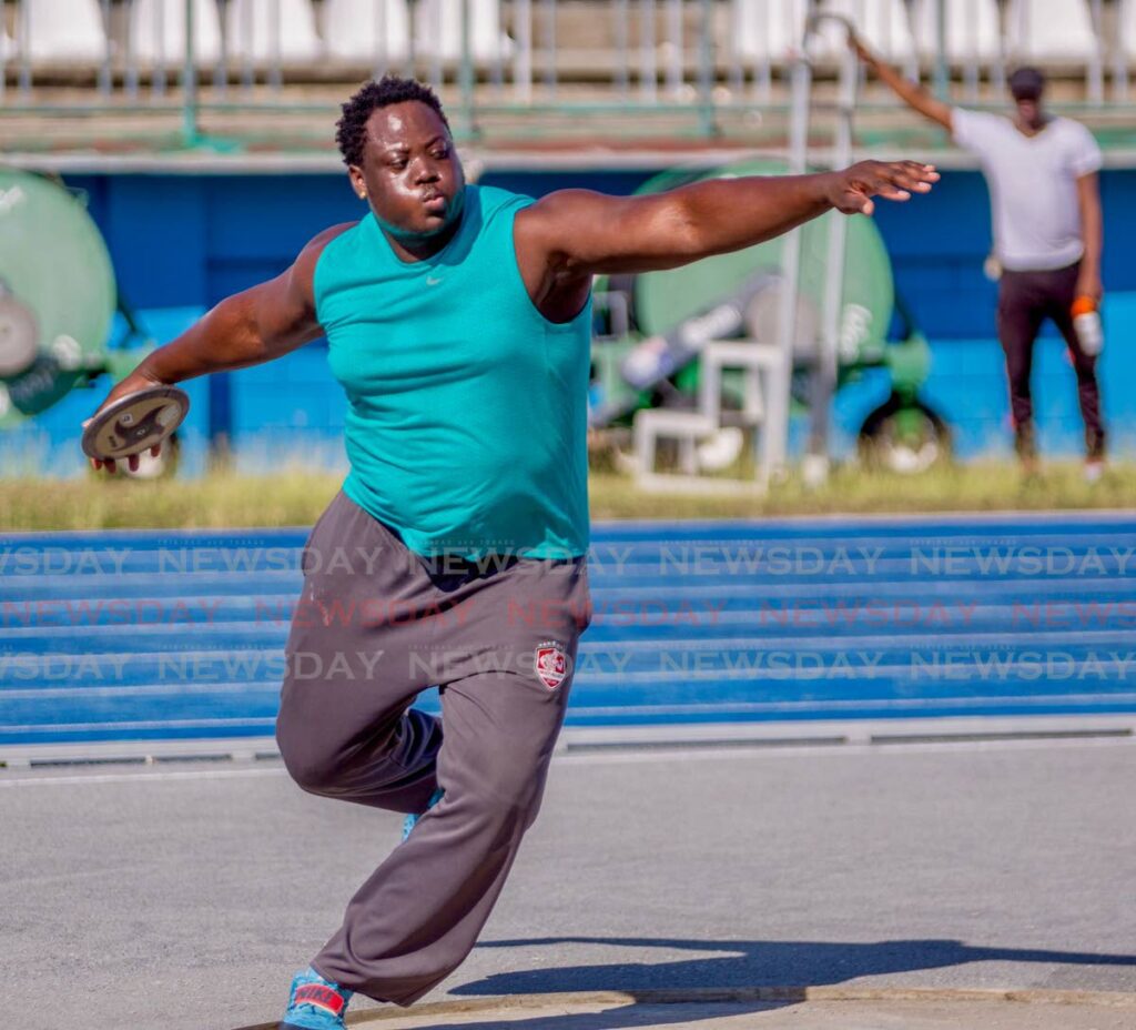 Akeem Stewart competes in the discus event at an NAAA Development Meet at the Dwight Yorke Stadium in Bacolet.  - DAVID REID 