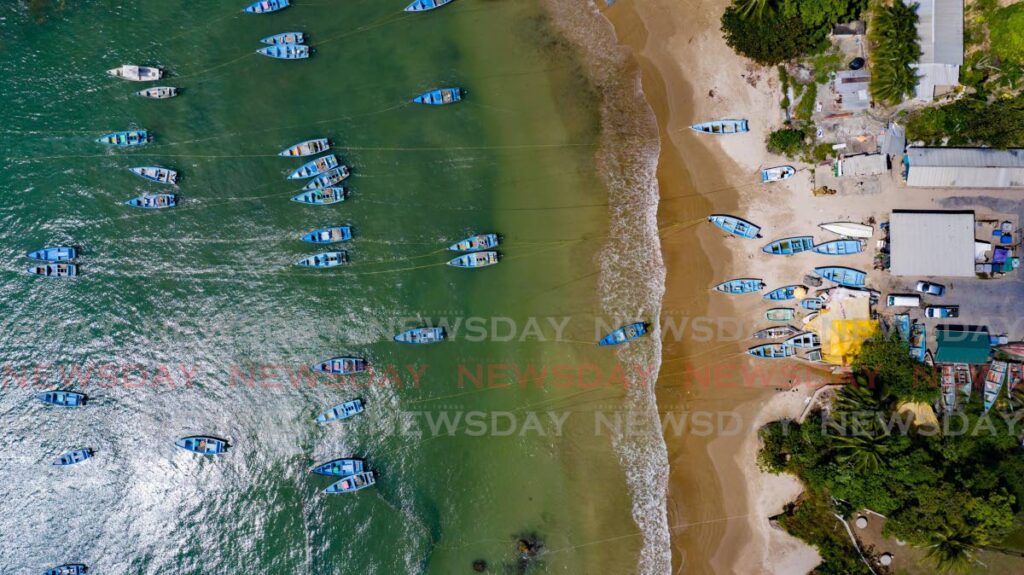 Pirogues used by fisherfolk anchored at Las Cuevas Bay. - File Photo/Jeff Mayers