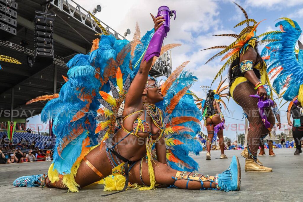 Masqueraders from Ronnie and Caro's mas band portray The Serengeti at the Queen's Park Savannah, Port of Spain, on Carnival Tuesday February 25, 2020, the last time Trinidad and Tobago held a street parade of bands since the covid19 pandemic. - 