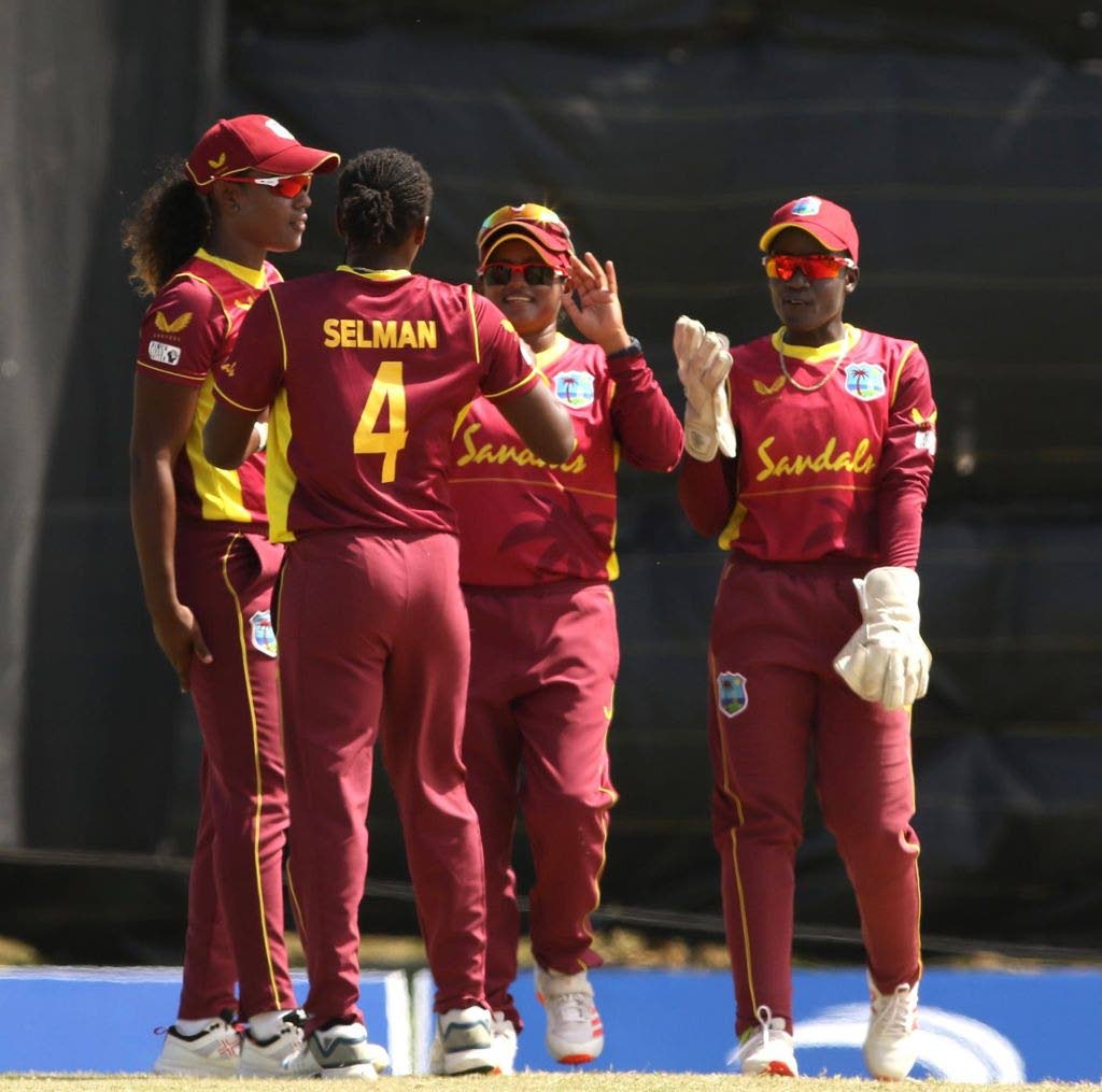 In this July 9, 2021 file photo, off-spinner Anisa Mohammed(C) and her West Indies Women team-mates celebrate taking a wicket against Pakistan, during the second One Day International, at Coolidge Cricket Ground, Antigua. - CWI Media