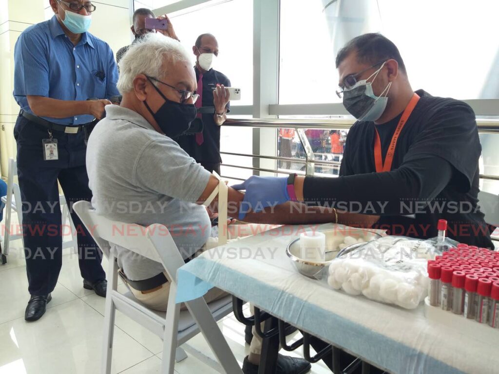 Health Minister Terrence Deyalsingh takes a prostate-specific antigen (PSA) test during the launch of the 2021 National Care Fair at the Southern Academy for the Performing Arts, San Fernando on October 29, 2021. - FILE PHOTO/TYRELL GITTENS