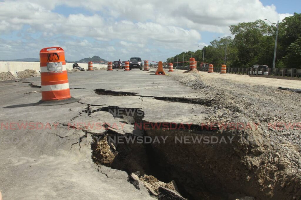 FILE PHOTO: Large cracks are visible in the Mosquito Creek portion of the Point Fortin Highway now under construction on January 24. - 