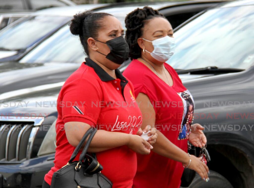 Minister of State in the Ministry of Education at Ministry of Education Lisa Morris-Julian, left, arrive at the Success Laventille Secondary School to attend a public meeting led by PM Keith Rowley on Saturday.  - AYANNA KINSALE