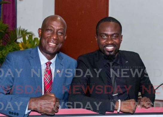 Prime Minister Dr Keith Rowley, left, and Chief Secretary Farley Augustine. FILE PHOTO - 