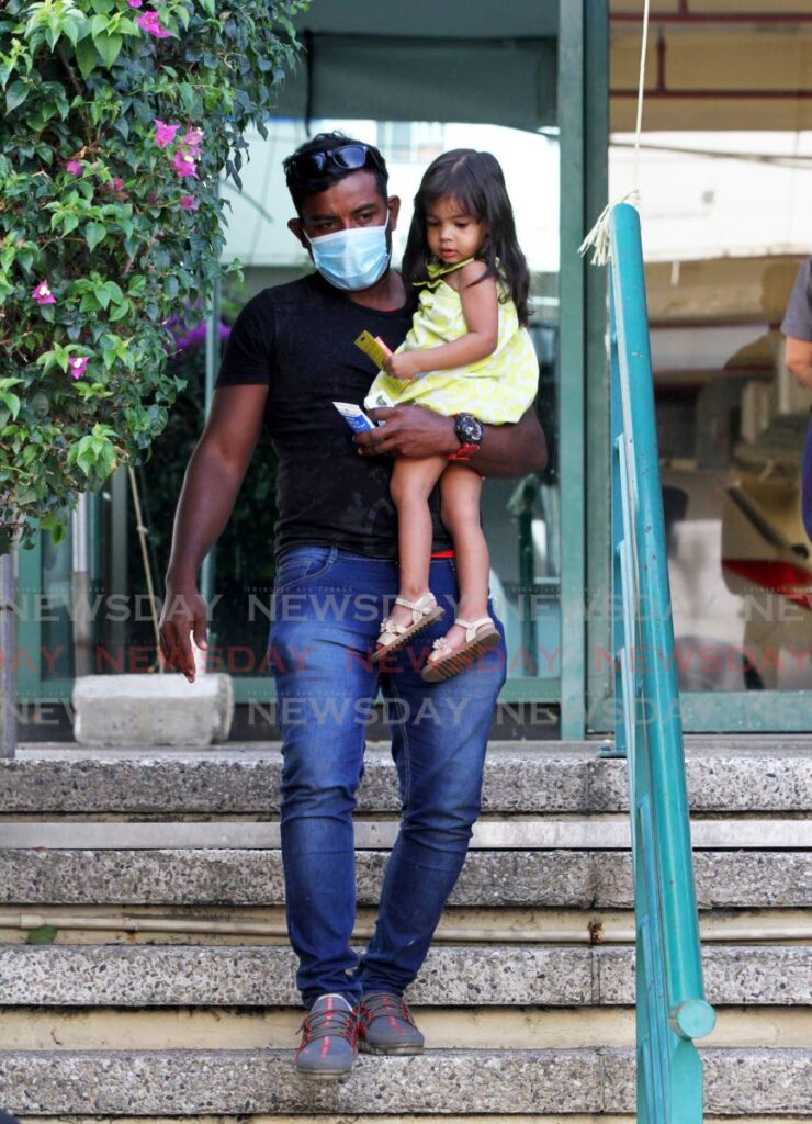 Yermi Santoyo, was reunited with his two-year-old daughter Danna Santoyo at the UNHCR on Wednesday. - Angelo Marcelle