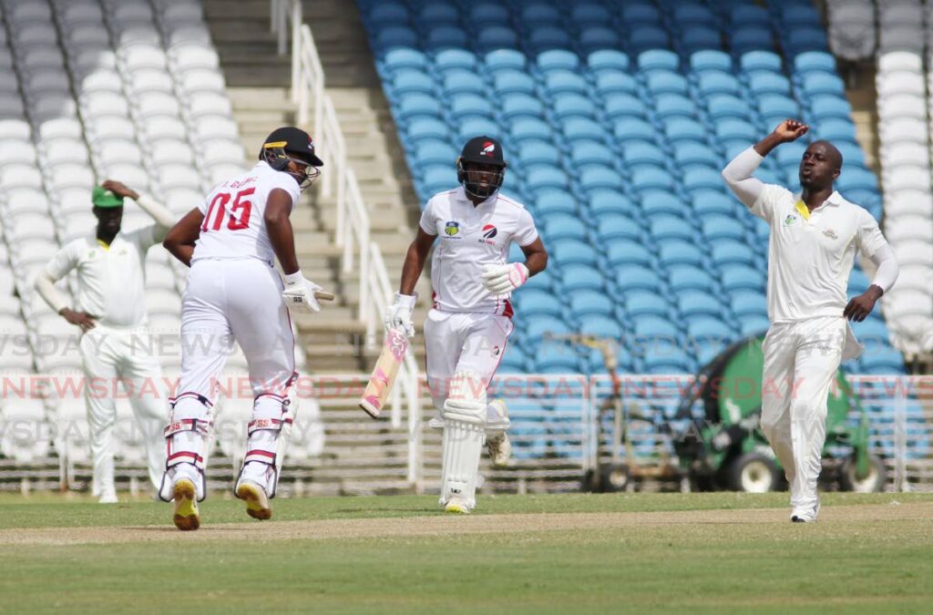 TT Red Force players Jyd Goolie(L) and Yannic Cariah run between the wickets in the CWI Four-Day Championship match against Jamaican Scorpions at Brian Lara Cricket Academy, Tarouba. - Lincoln Holder