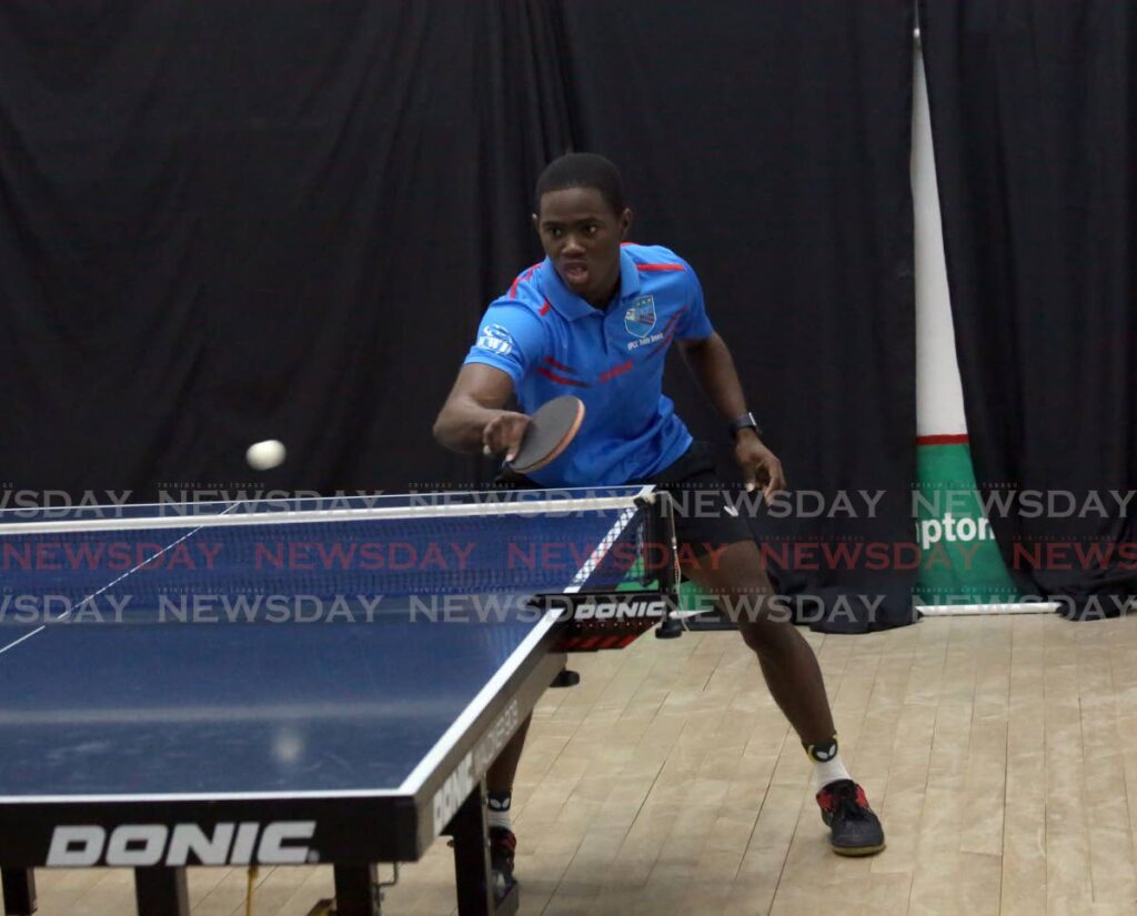 Derron Douglas plays a return during his match at the QPCC Invitational Table Tennis Tournament, at the Queen’s Park Oval, St Clair, on Saturday.  - SUREASH CHOLAI