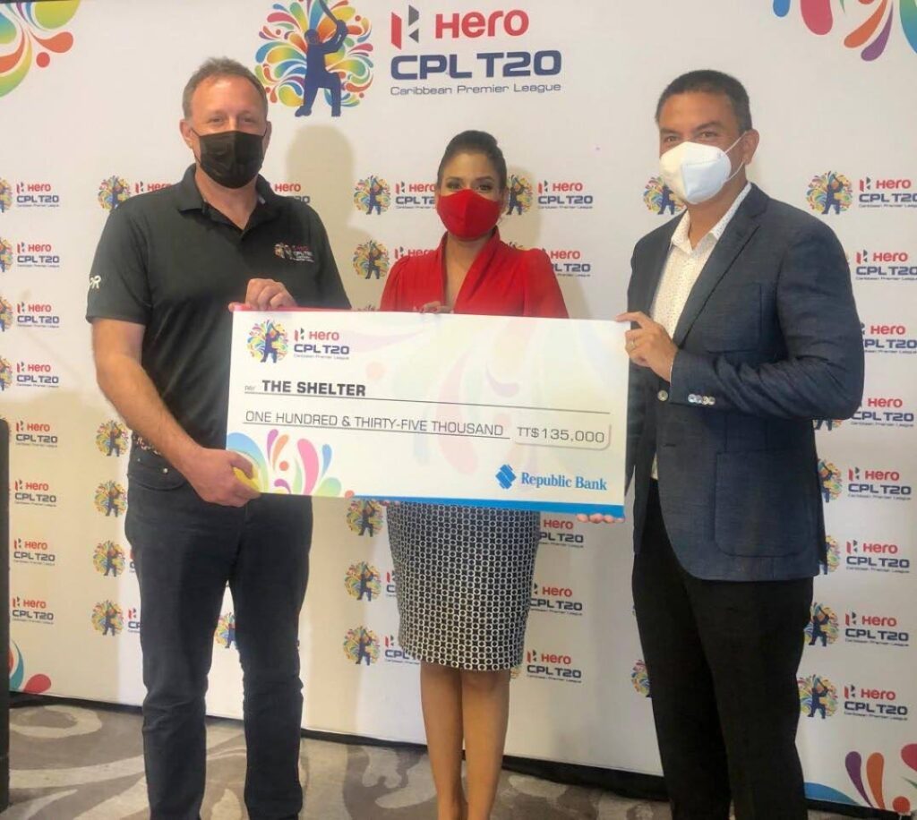 Hero Caribbean Premier League CEO Pete Russell (L) presents a cheque to Dr Maryam Abdool-Richards (C) and Colin Mitchell (R) of The Shelter, on Monday, at the Hyatt Regency, Port of Spain.  - Photo courtesy Hero CPLT20 