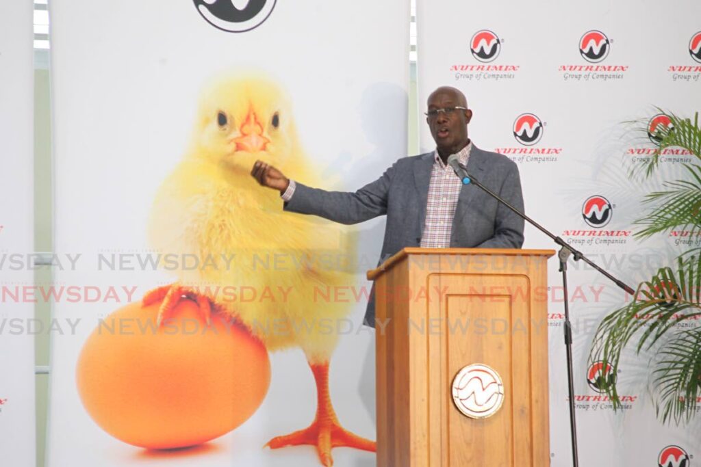 Prime Minister Dr Keith Rowley delivers the feature address at the official opening of the Nutrimix Next Generation hatchery at Brechin Castle on Monday. - Roger Jacob