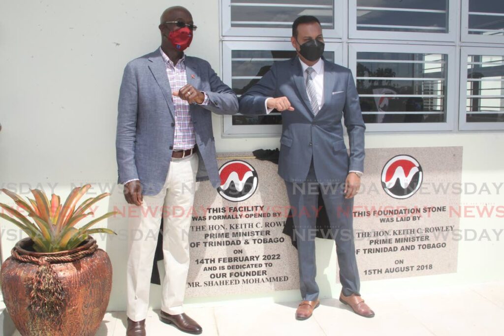 Prime Minister Dr Keith Rowley and Nutramix director Ronnie Mohammed at the launch of the company's next-generation hatchery at Brechin Castle, Couva on Monday. - Roger Jacob