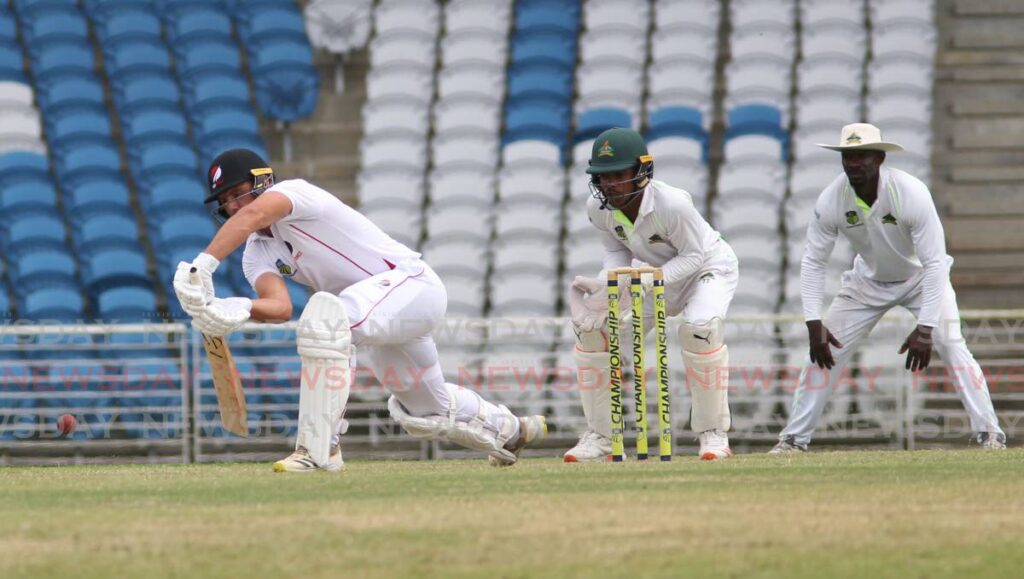 In this photo taken on Tuesday, TT Red Force vice-captain bats against the Windward Islands Volcanoes, during the second day of their CWI Regional Four-Day Championship match, at the Brian Lara Cricket Academy, Tarouba. Red Force won the match by an innings and 43 runs. - Lincoln Holder