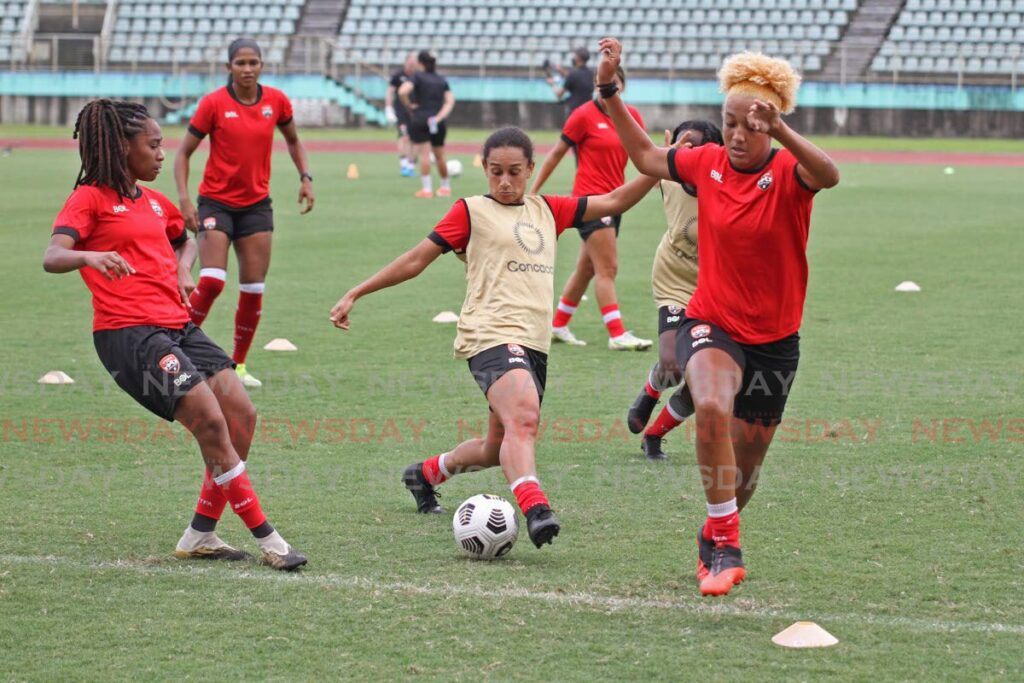 Trinidad and Tobago women's footballers take part in a scrimmage at the Manny Ramjohn Stadium, Marabella on Tuesday.  - Marvin Hamilton