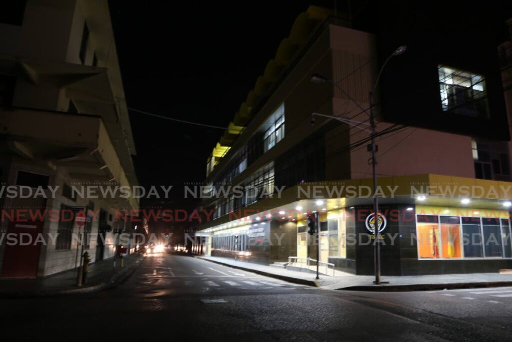 While most of the country remained in darkness on Wednesday night, T&TEC on Park Street, Port of Spain seemed to be unaffected.  - JEFF K MAYERS