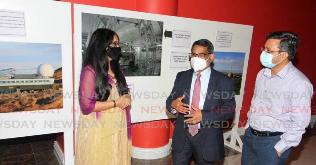 Feature speaker and Senior Lecturer in the Department of Physics at UWI, Dr Shirin Haque; High Commissioner of India to Trinidad and Tobago Arun Kumar Sahu and Head of the Department of Physics at UWI, Dr Davinder Sharma, at the Exhibition of India's Civil Nuclear Sector, Mahatma Gandhi Institute for Cultural Co-Operation, Mt Hope on Thursday. - Angelo Marcelle