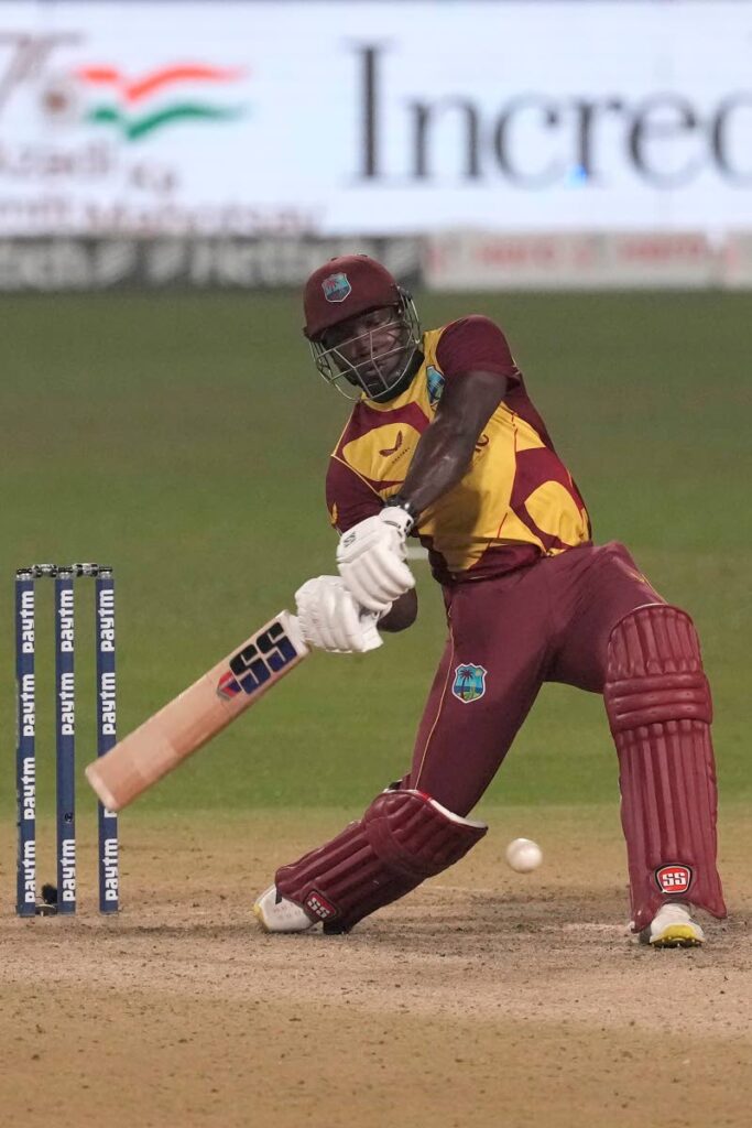 West Indies' Rovman Powell plays a shot during the second Twenty20 International between India and West Indies in Kolkata, India, on Friday. (AP PHOTO) - 