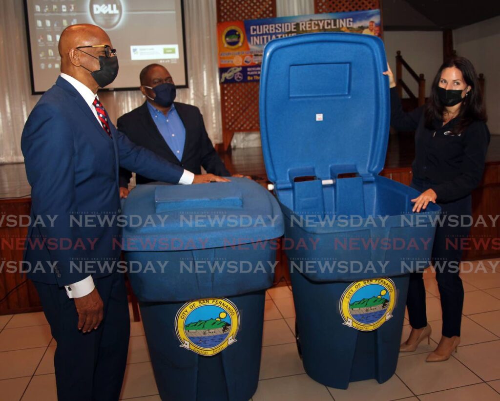 From left, San Fernando Mayor Junia Regrello with CEO of SWMCOL Kevin Thompson and Isabelle Ross, marketing assistant of Rotoplastic  at the launch of curbside recycling  initiative in collaboration with the Rotary Club of San Fernando on February 17. - Photo by Lincoln Holder