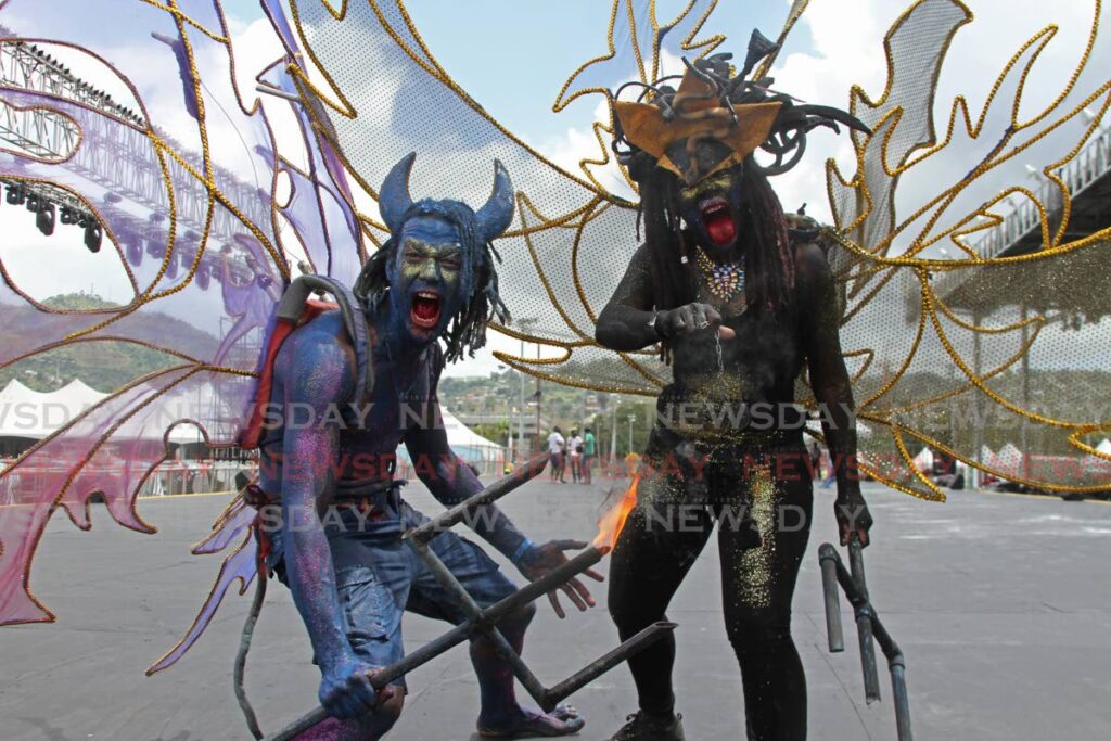 Stefeano Olando and Stephanie Bailey portray Bo Djable and Medusa at The Taste of Carnival's Traditional and Conventional Mas Competition at Carnival City, Queen's Park Savannah. - Marvin Hamilton