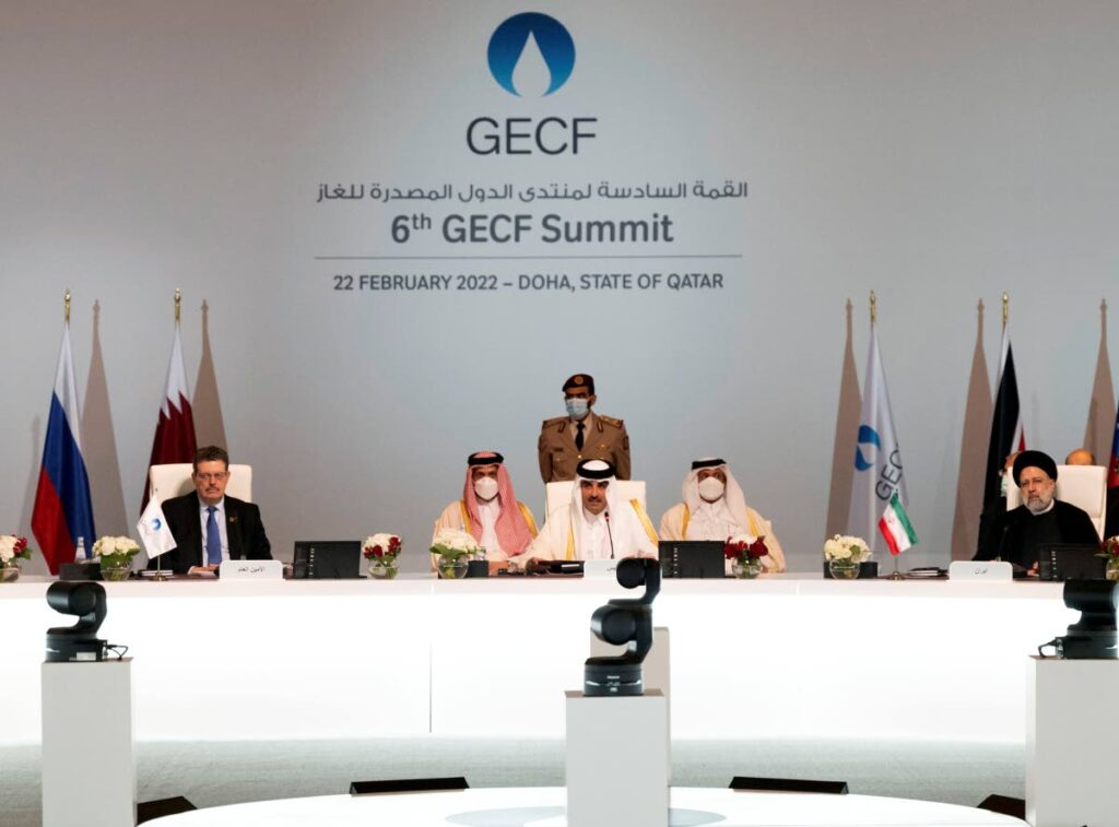 In this photo released by Amiri Diwan, Qatari Emir Tamim bin Hamad Al Thani, centre, gives a speech during the opening of the Gas Exporting Countries Forum in Doha, Qatar, on Tuesday. AP PHOTO