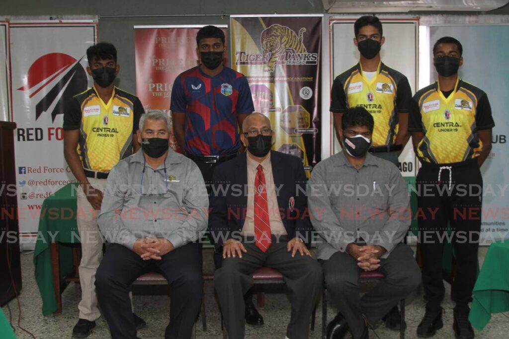 (seated from left) General manager of Tiger Tanks Ltd Denis Latiff, president of the TT Cricket Board Azim Bassarath and The Price Club’s director Shamshad Ali are joined by players at the launch of the under-19 Inter-Zone cricket tournament at Alloy Lequay centre, Balmain Couva, on Wednesday. - Marvin Hamilton