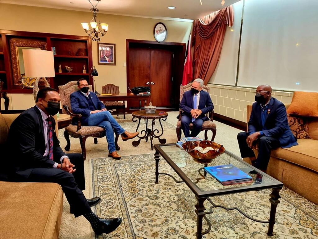 PM Rowley meets ministers on Friday night at Piarco Airport upon his return from an energy conference in Qatar after flight delays. PHOTO COURTESY OPM FACEBOOK PAGE - 