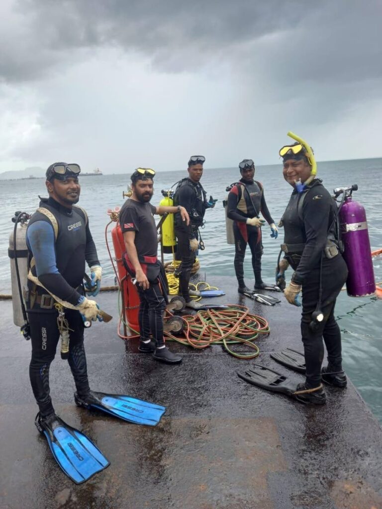 File photo: The five divers employed by a private company hired by Paria Trading Co Ltd to do maintenance work on a 36-inch pipeline in one of the last photos taken at Pointe-a-Pierre on Friday.  From left are, Christopher Boodram, who survived, Kazim Ali Jr, Yusuf Henry, Rishi Nagassar and Fyzal Kurban. 