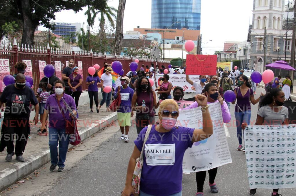 In this March 2018 file photo, women and supporters take part in the International Women's Day march in Port of Spain. - 