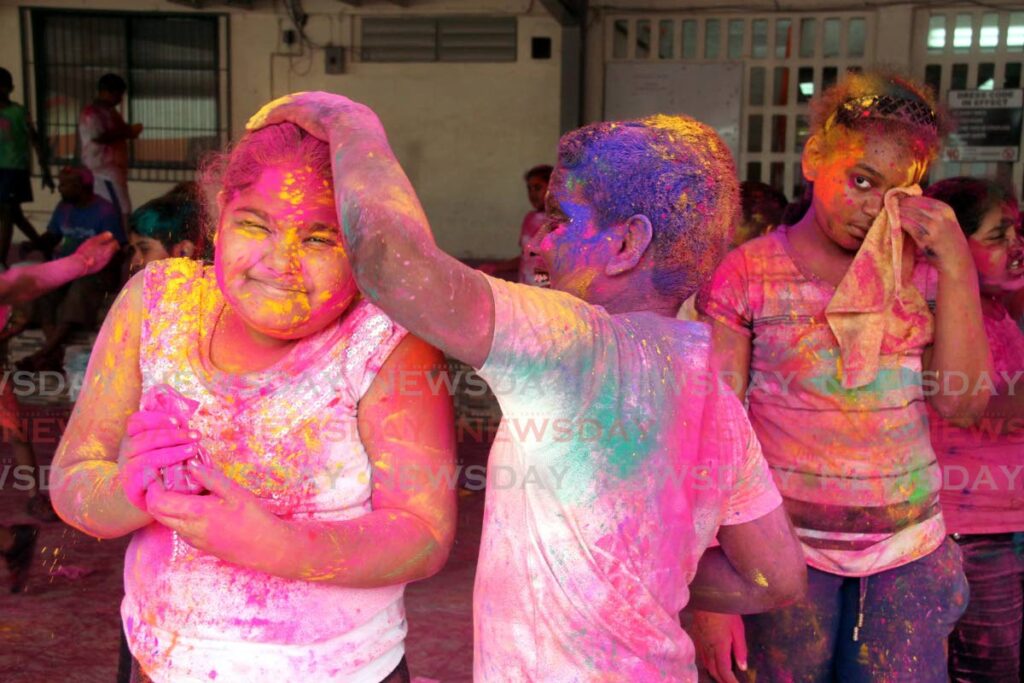Children enjoy Phagwa celebrations at Tunapuna Hindu School. FILE PHOTO  - 