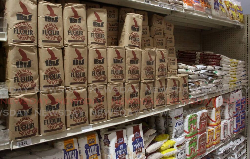 Packs of flour on a shelf at a supermarket in San Juan. Photo by Sureash Cholai