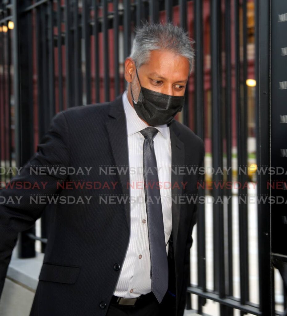 In this file photo, former senator Clarence Rambharat makes his way to a Parliament sitting.  - Photo by Sureash Cholai