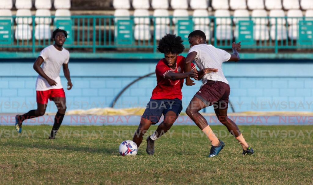 In this February 11 file photo, Tobago footballers take part in a scrimmage at the Dwight Yorke Stadium, Bacolet. - David Reid