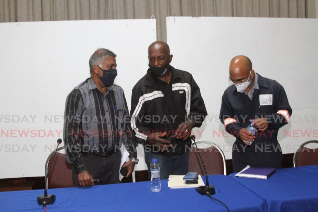 From left, Paria Fuel Trading Company general manager Mushaq Mohammed, its chairman Newman George and terminal operations manager Collin Piper during a media briefing on February 27. - Marvin Hamilton