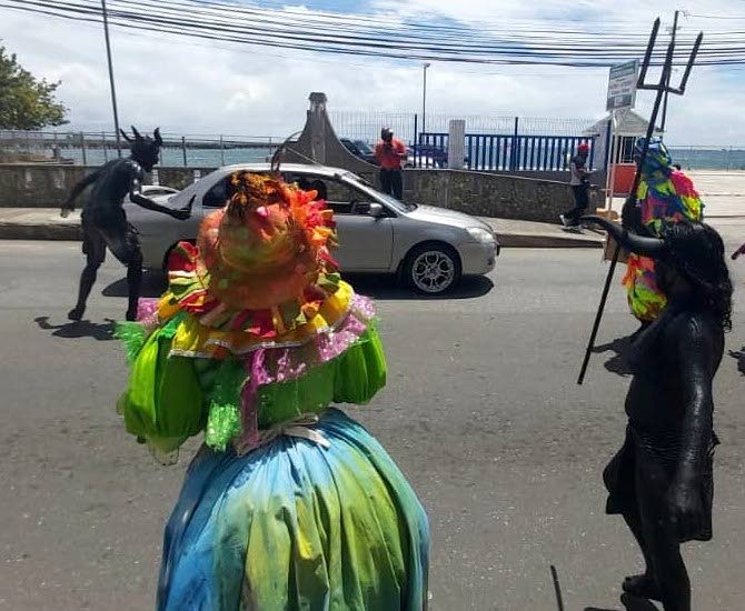 Traditional Carnival characters roamed the streets of Scarborough on Tuesday as the curtain came down on Carnival Footprints, a scaled-down showcase of the annual festival. - THA