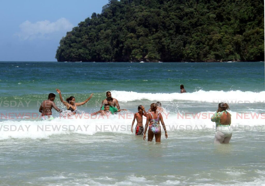 In this March 2022 file photo Beachgoers enjoy themselves at Maracas Beach.  Photo by Ayanna Kinsale