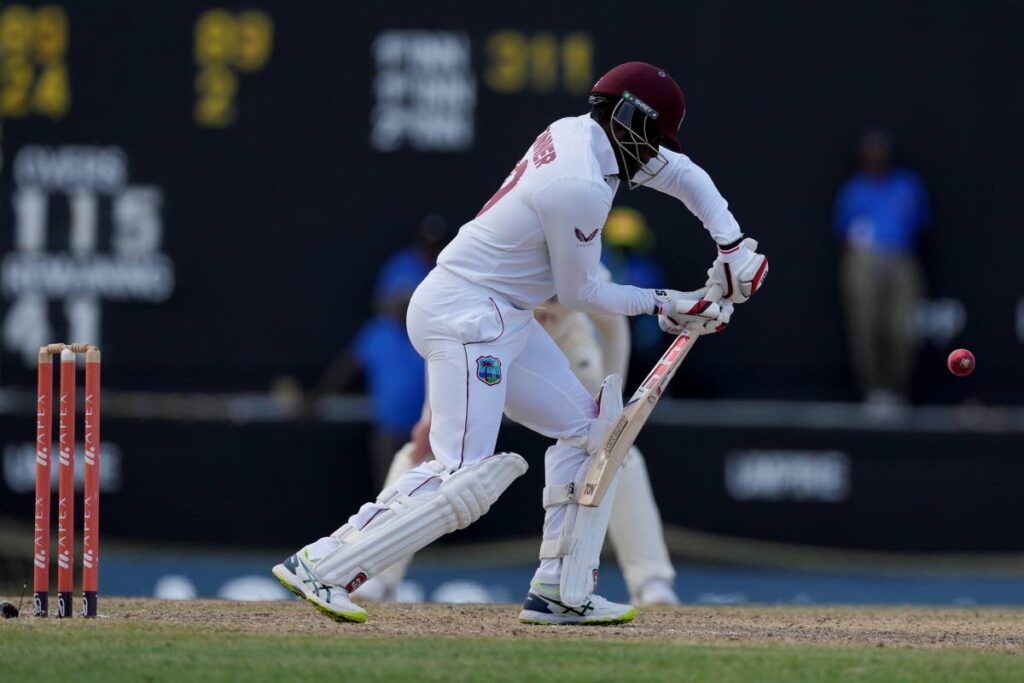 West Indies' Nkrumah Bonner plays a shot during day three of the first Test at the Sir Vivian Richards Cricket Ground in North Sound, Antigua, on Thursday. (AP Photo) - 