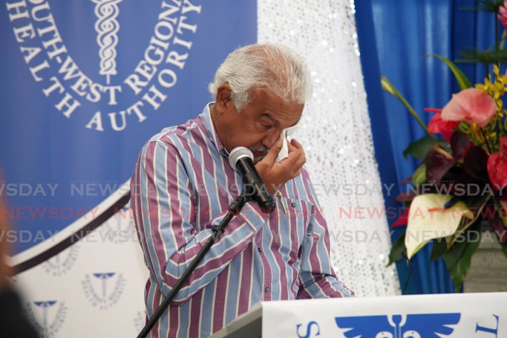An emotional Health Minister Terrence Deyalsingh at the rededication ceremony of the Point Fortin Hospital. - Photo by Lincoln Holder