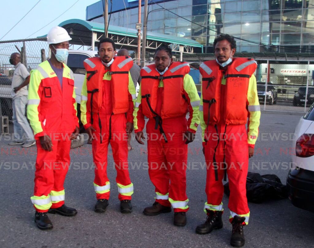 RESCUED: Four of the five men rescued after their boat sank in the sea off Tobago last Thursday. They are from left, James Kirwan, Jerome Nicome, Kyle Dyer and Azim Baksh, outside the Tobago Terminal in Port of Spain on Sunday afternoon. PHOTO BY ROGER JACOB - 