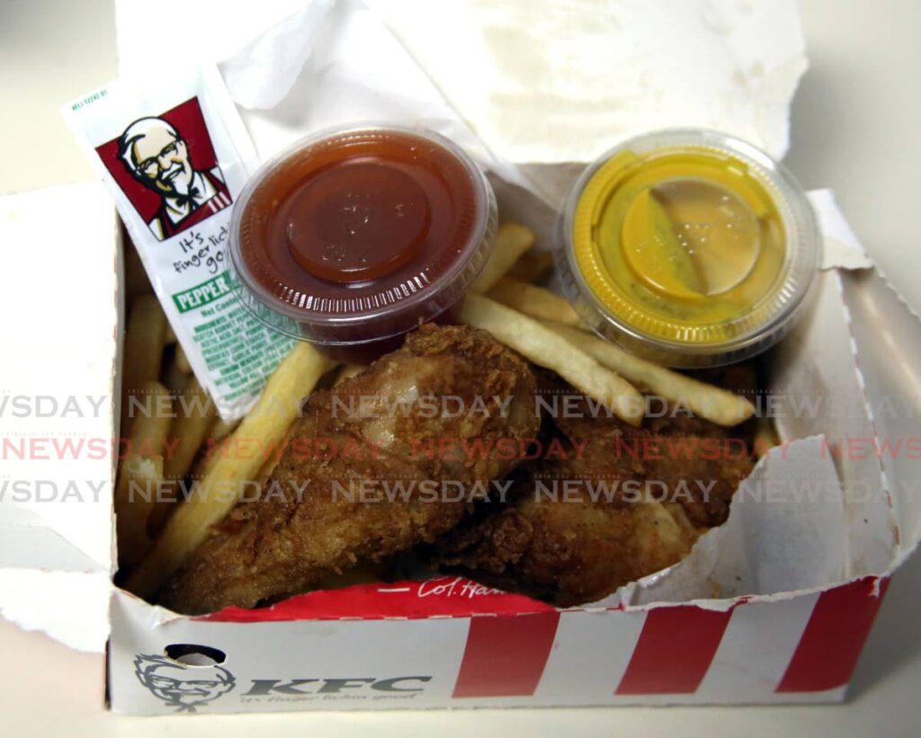 KFC has begun to charge $2 extra for condiments. In photo a meal purchased with added condiments from KFC's Park Street branch on Monday. - SUREASH CHOLAI