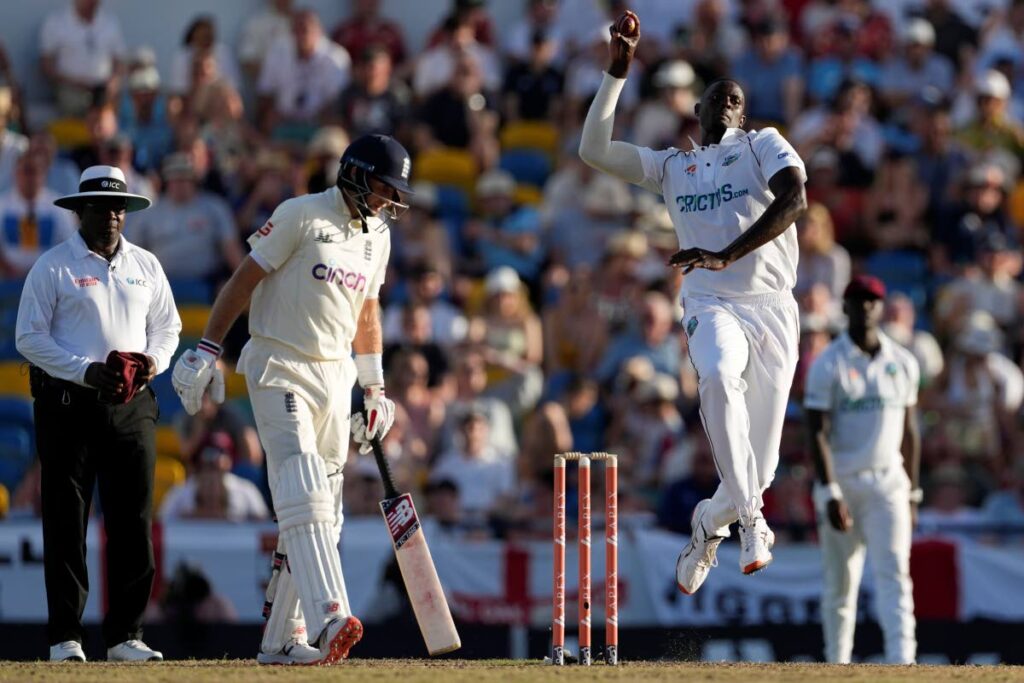 West Indies’ Jason Holder bowls during day one of the second Test match against England at the Kensington Oval in Bridgetown, Barbados, on March 16. (AP Photo) - 