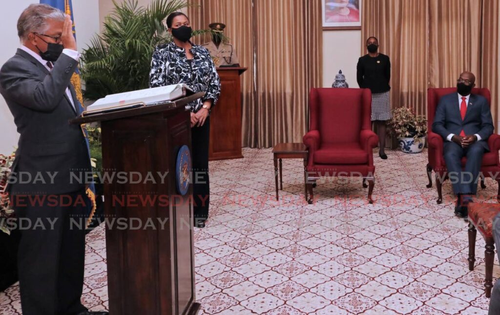 I SWEAR: Reginald Armour, SC, is sworn in as the Attorney General and Minister of Legal Affairs on Wednesday at President's House. PHOTO COURTESY OFFICE OF THE PRESIDENT - 