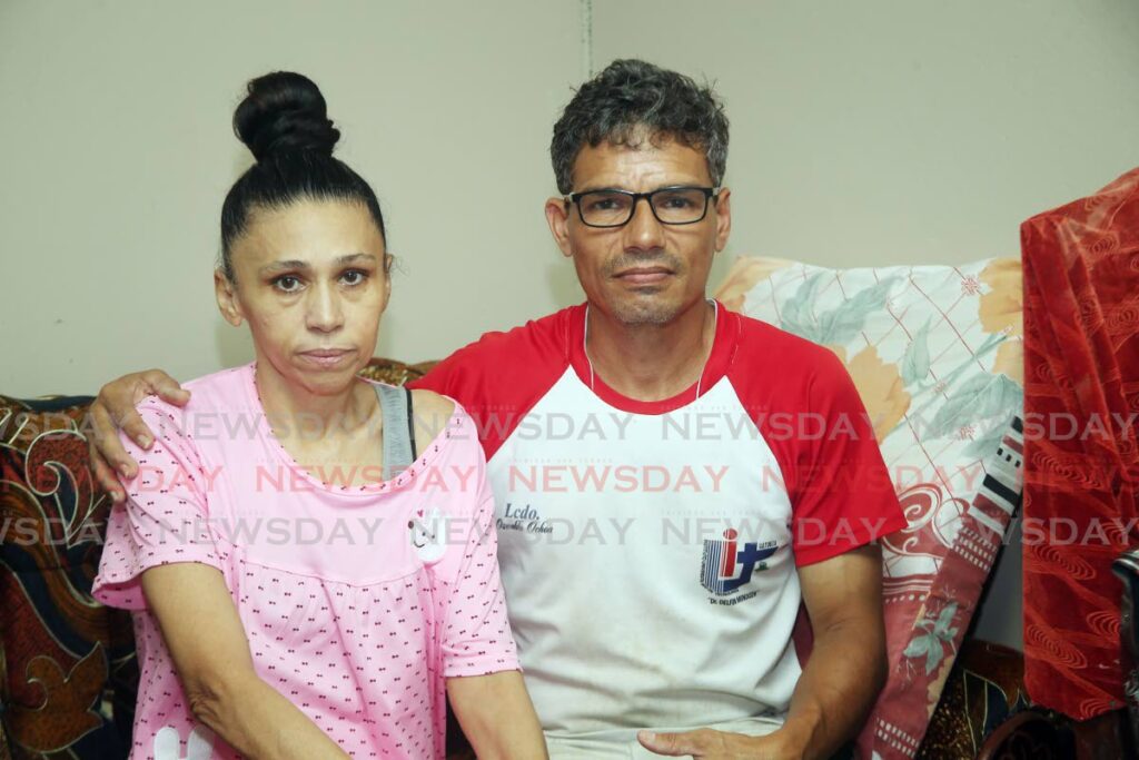 HELP US: Venezuelan mother of two Yhadira Sotillo and her husband Avinash Ochoa at their home in Penal. Sotillo is appealing for help to defray the cost of surgery for her cancer. PHOTO BY LINCOLN HOLDER  - 