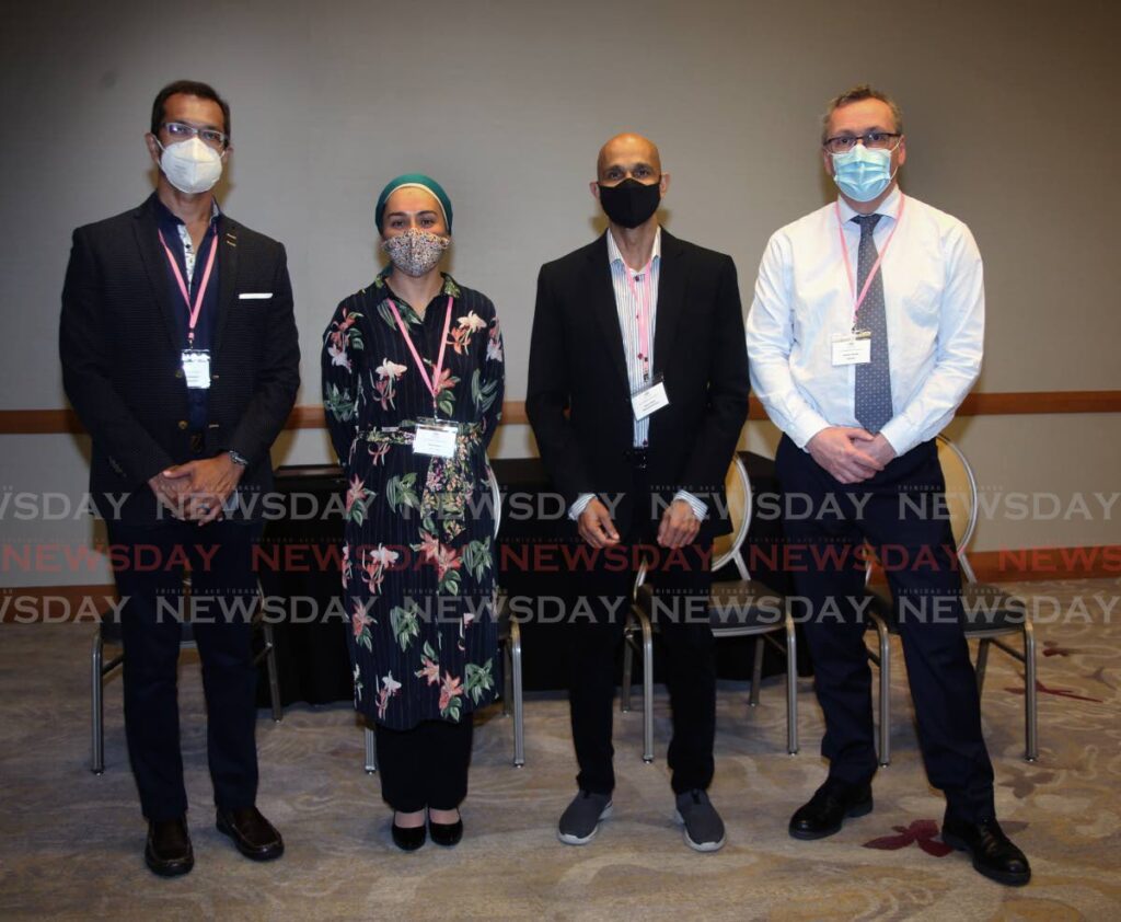 The Eye Hospital team, from left, Shivaand Ramdeen,Rehna Khan, Ronnie Bhola and Stephen Winder. - Photo by Sureash Cholai
