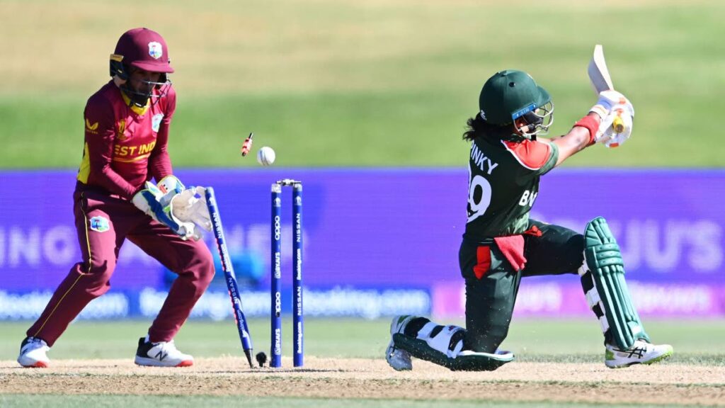 Fargana Hoque of Bangladesh is bowled out by Afy Fletcher of the West Indies during the 2022 ICC Women's Cricket World Cup match between Bangladesh and West Indies at Bay Oval on Friday in Tauranga, New Zealand. PHOTO COURTESY ICC. - 